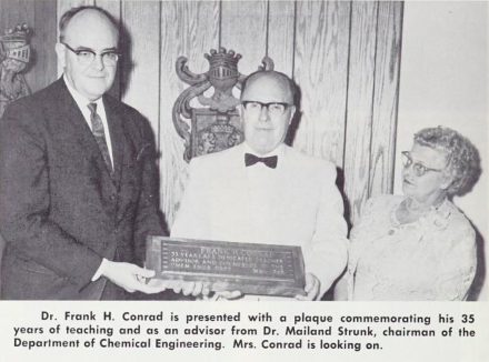 Dr. Frank H. Conrad is presented with a plague commemorating his 35 years of teaching and as an advisor from Dr. Mailand Strunk, chairman of the Department of Chemical Engineering. Mrs. Conrad looks on. (1969)
